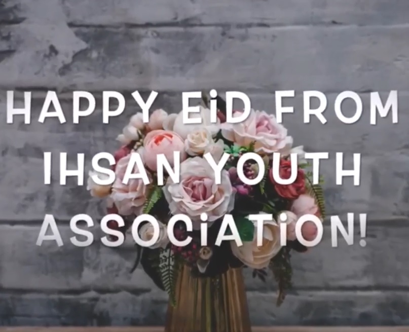 A floral bouquet behind an Eid greeting from Ihsan Youth Association